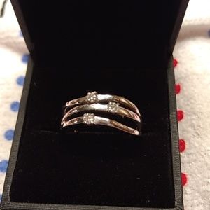 Charles Winston three stone moissanite fire ring